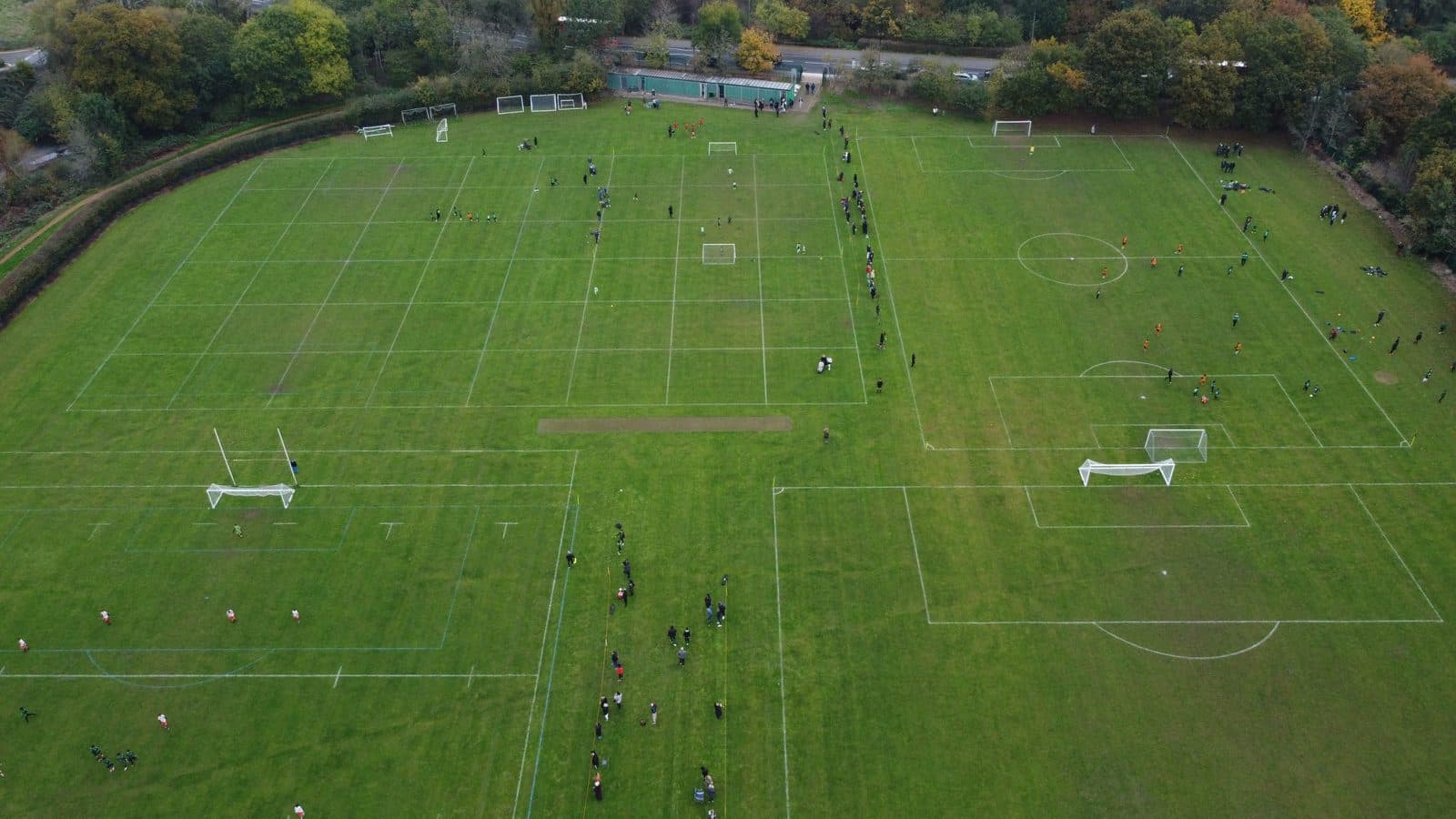 Aerial view of grassroots football pitches on a Celtic FC 1995 match day