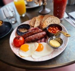 Full English breakfast with eggs, sausages, beans and toast served at a Parogon Group restaurant